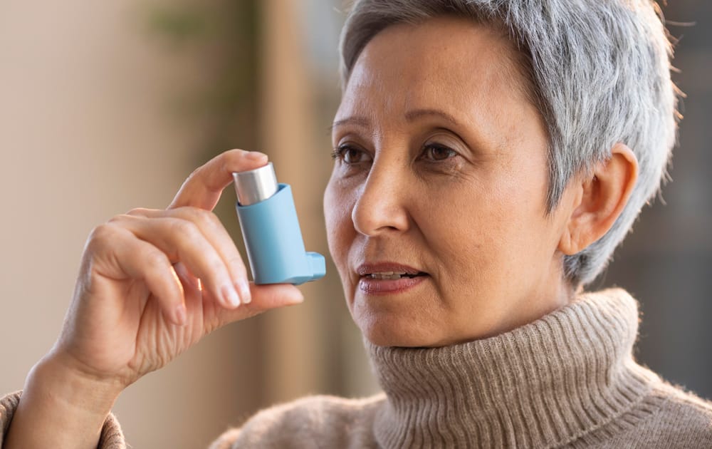 Article 1000 X 630 senior woman holding asthma inhaler 2