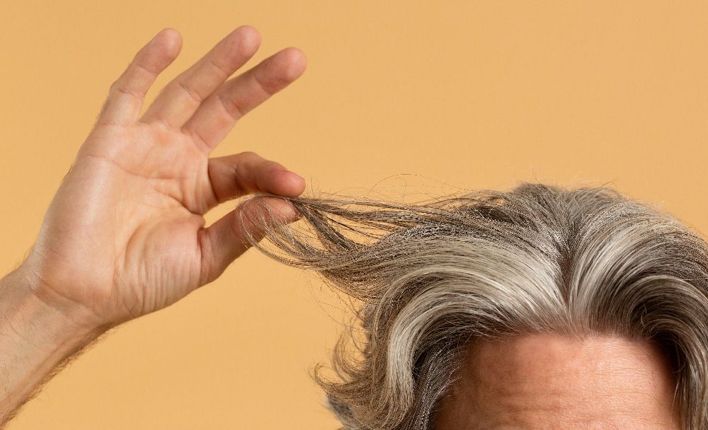 premature greying of hair - symptoms of leucoderma